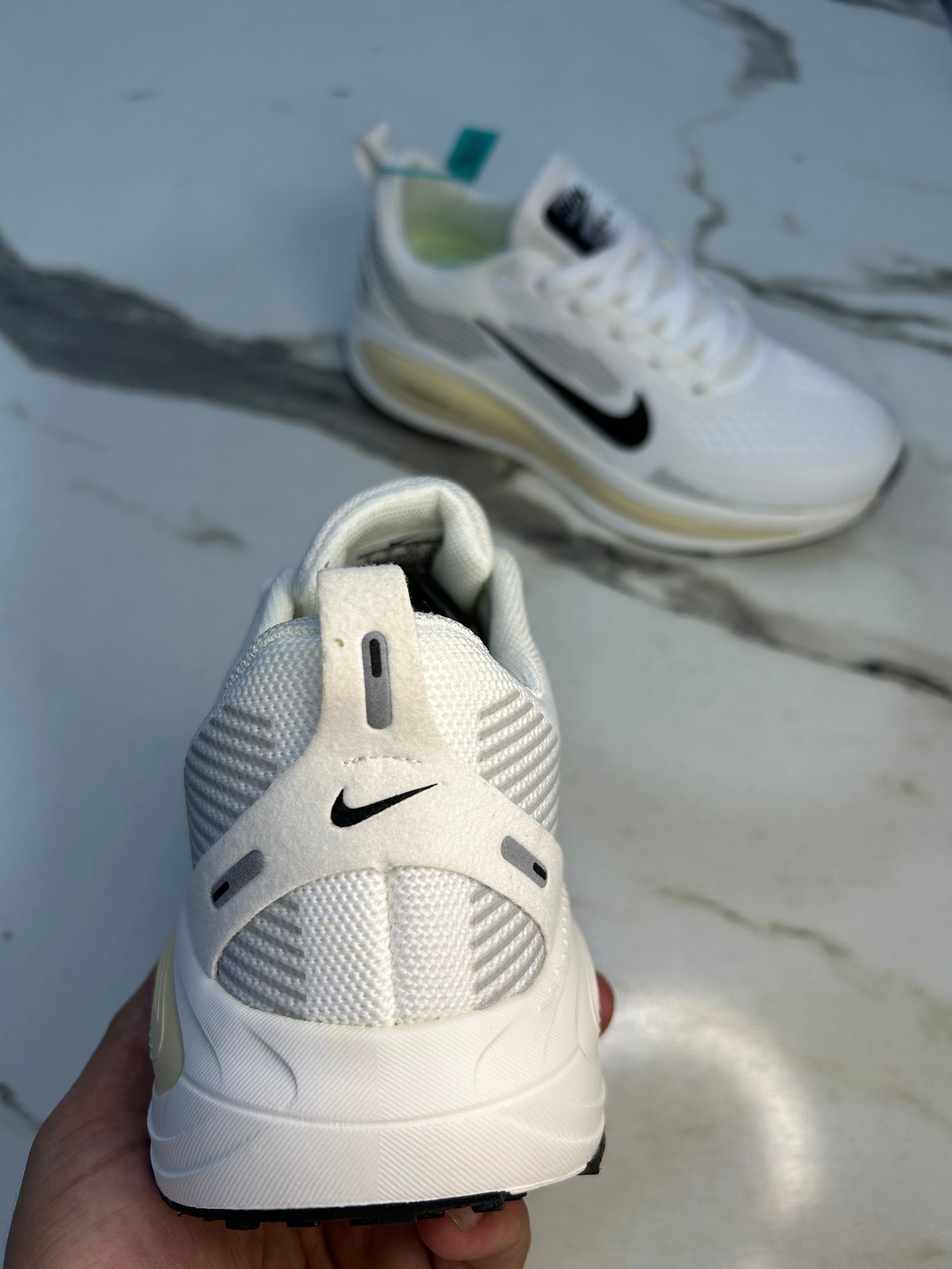 NK Zoom X Vomero 18
