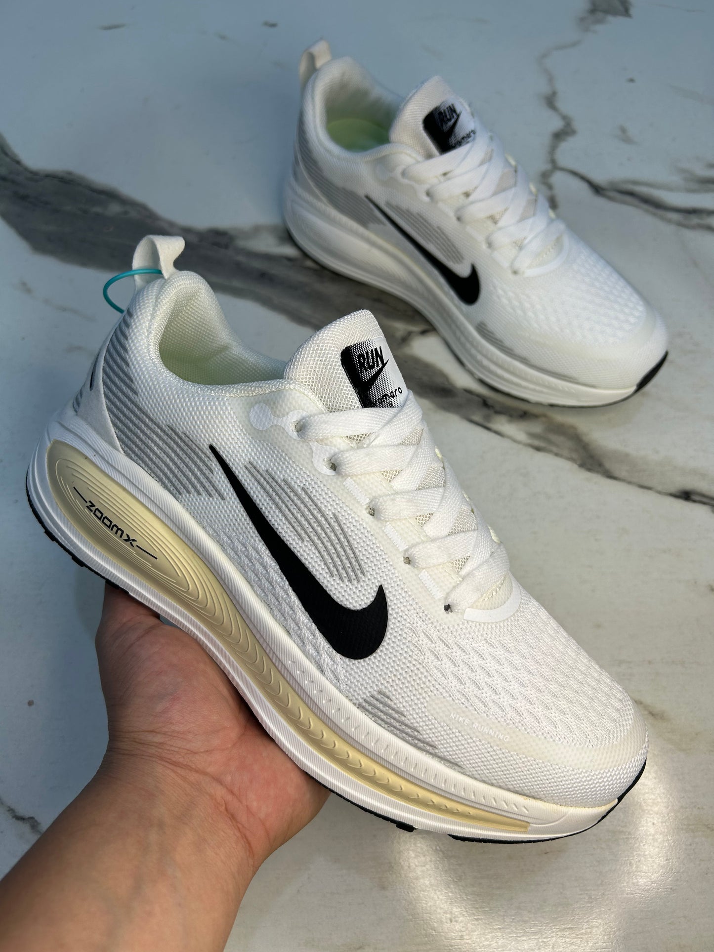 NK Zoom X Vomero 18