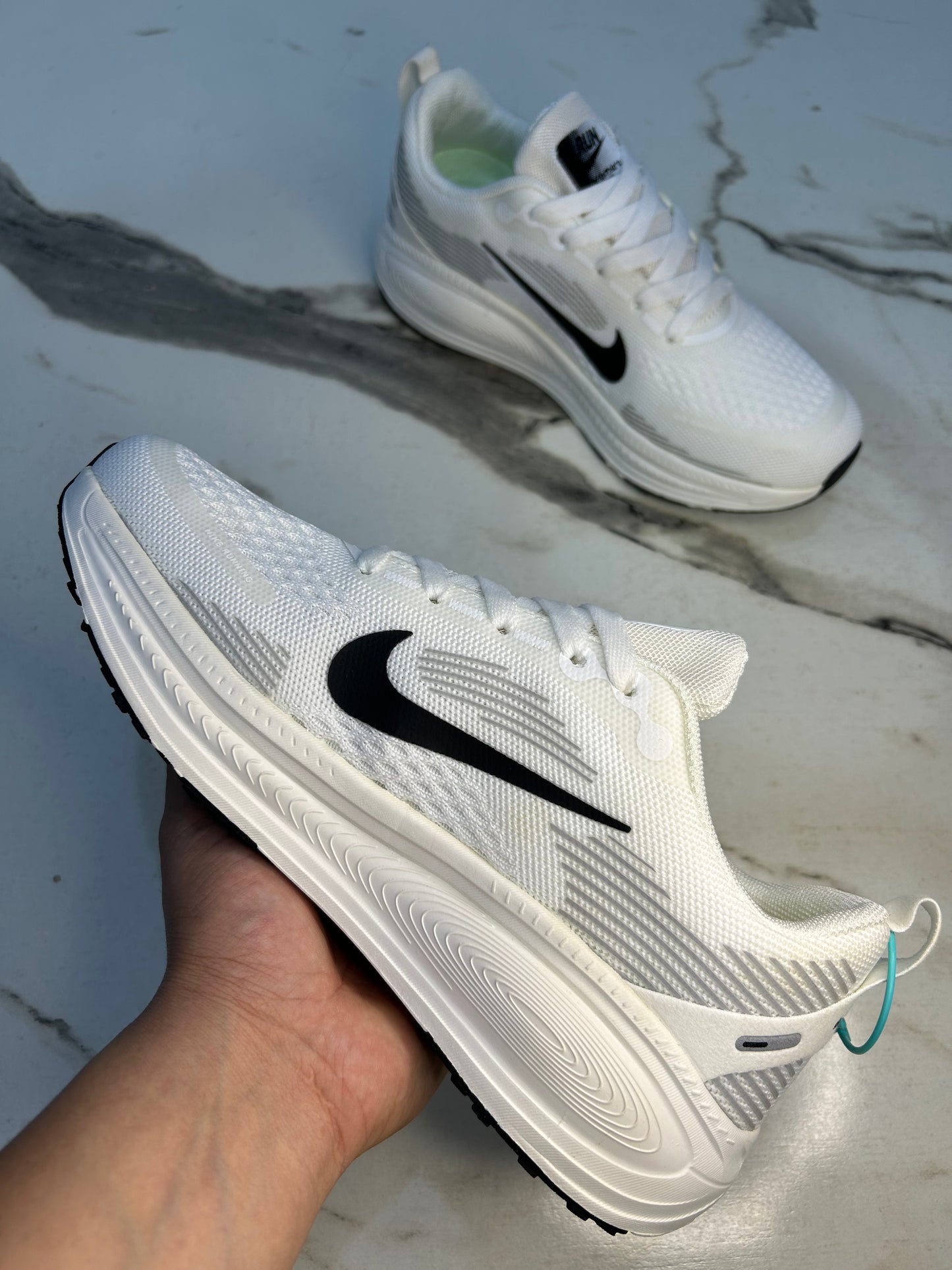 NK Zoom X Vomero 18