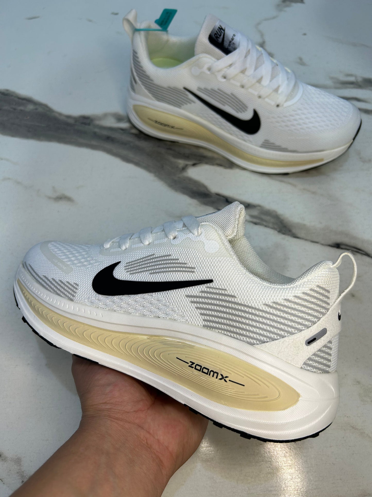 NK Zoom X Vomero 18