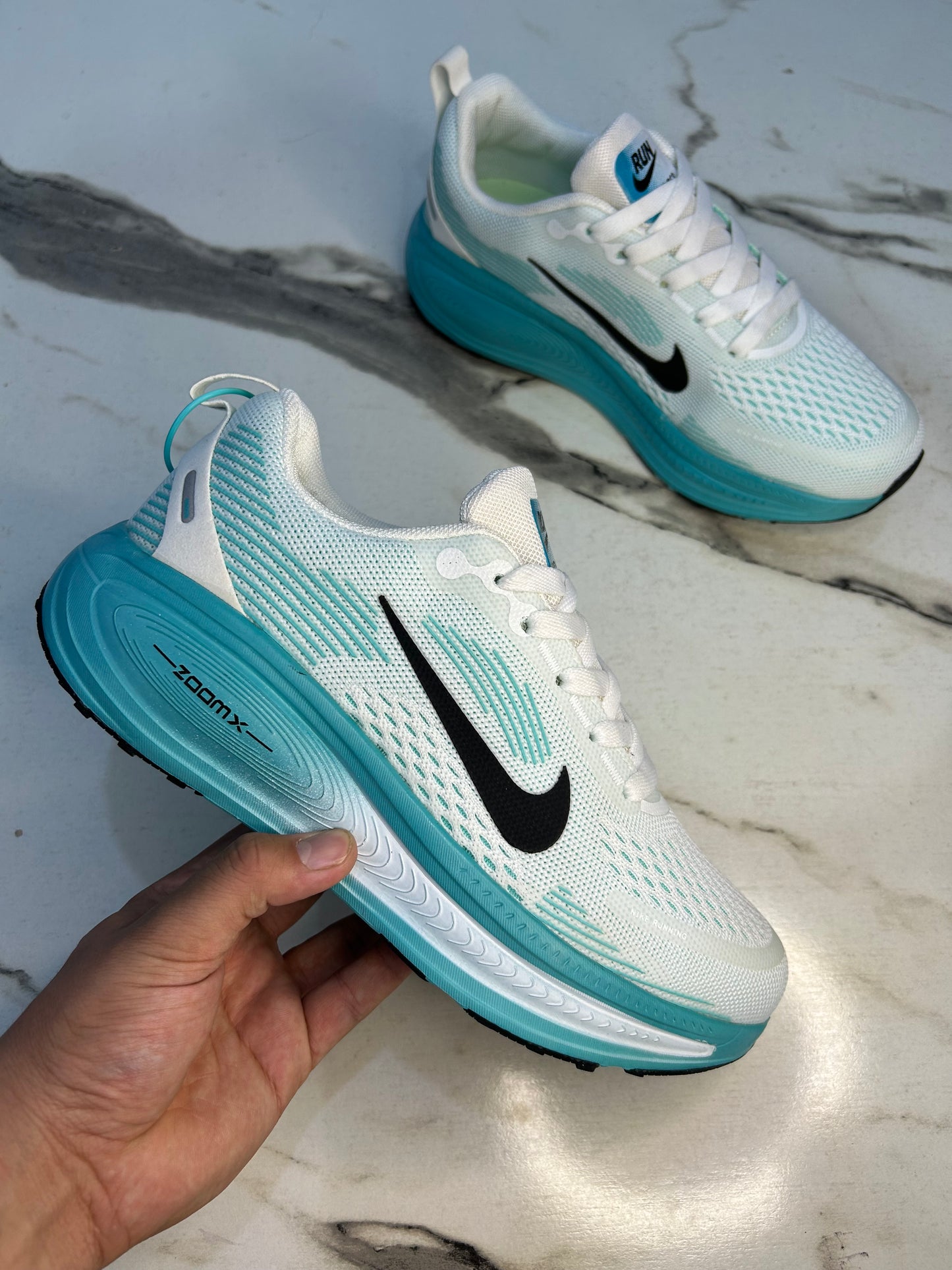 NK Zoom X Vomero 18