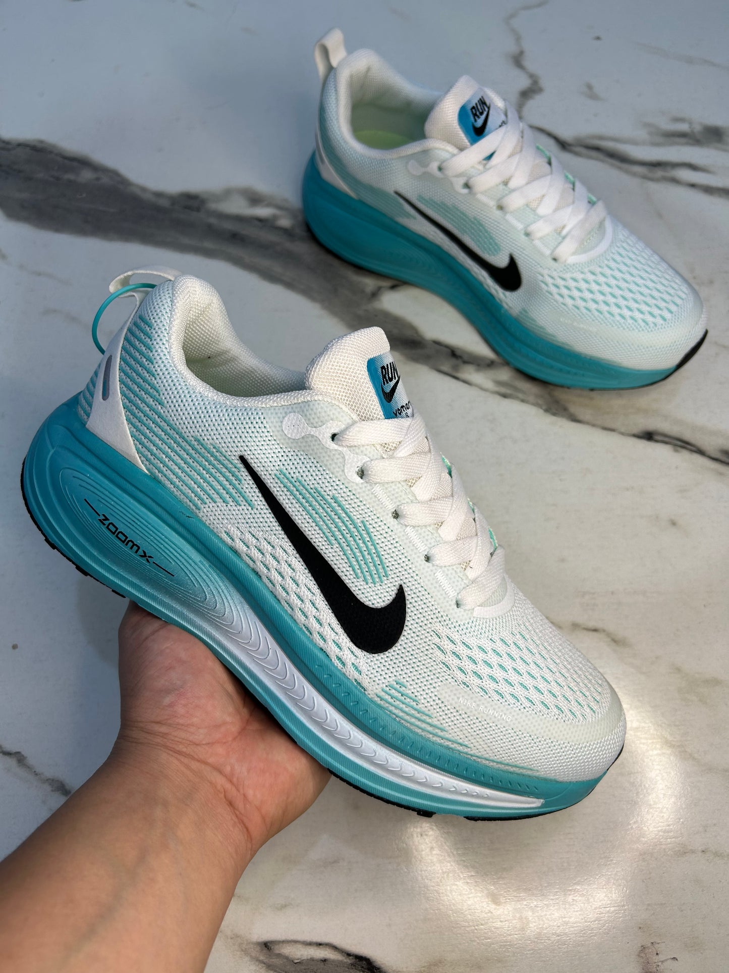 NK Zoom X Vomero 18