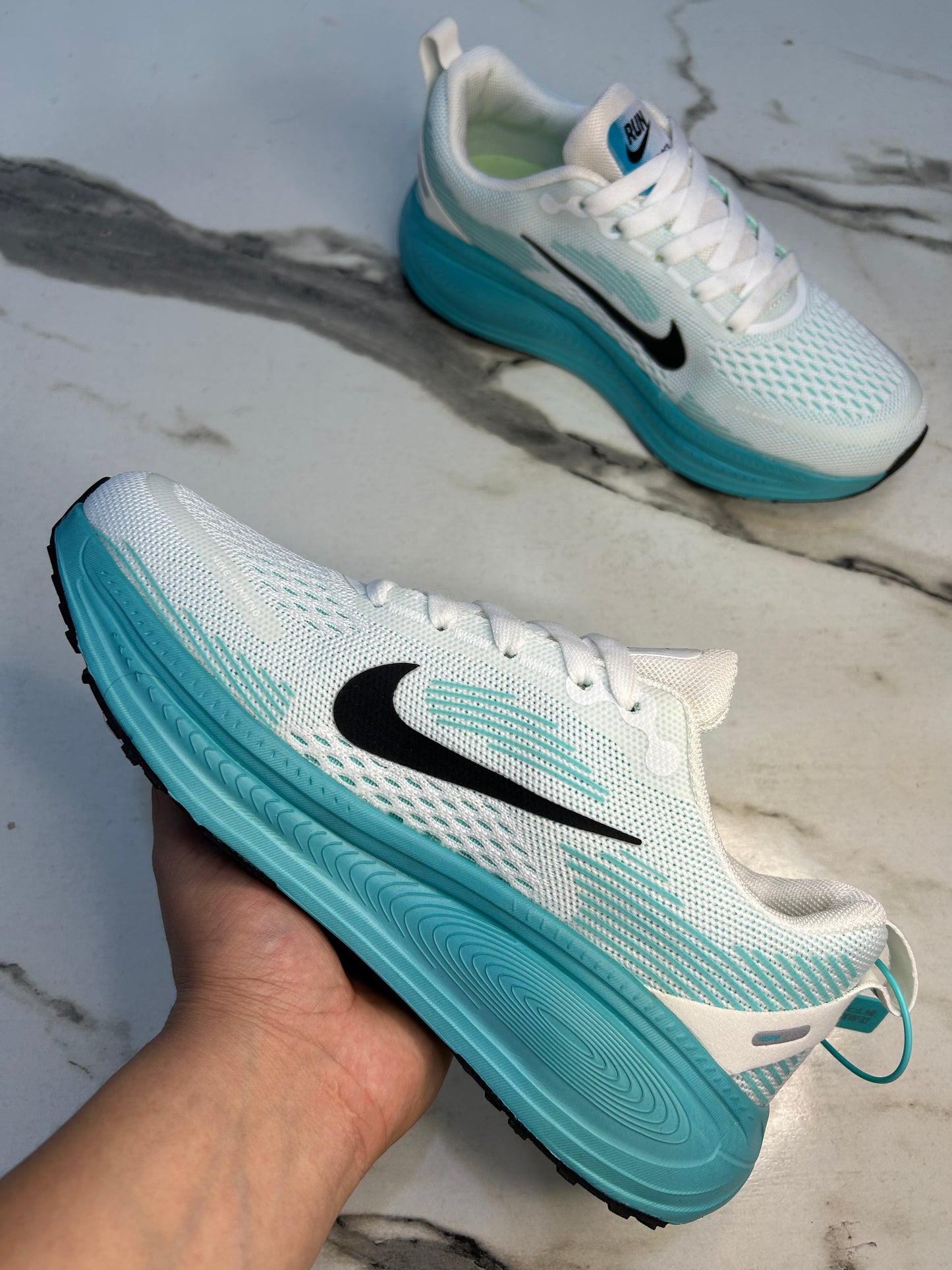 NK Zoom X Vomero 18
