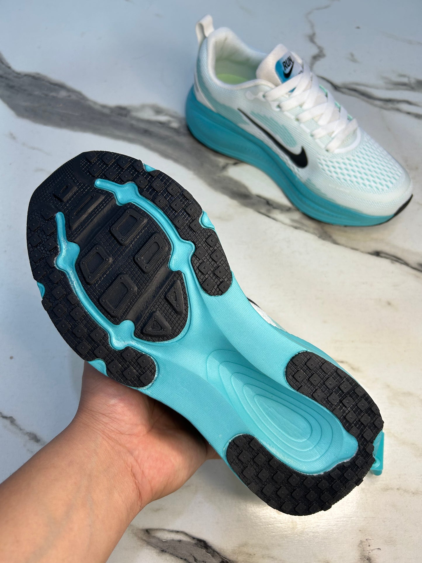 NK Zoom X Vomero 18