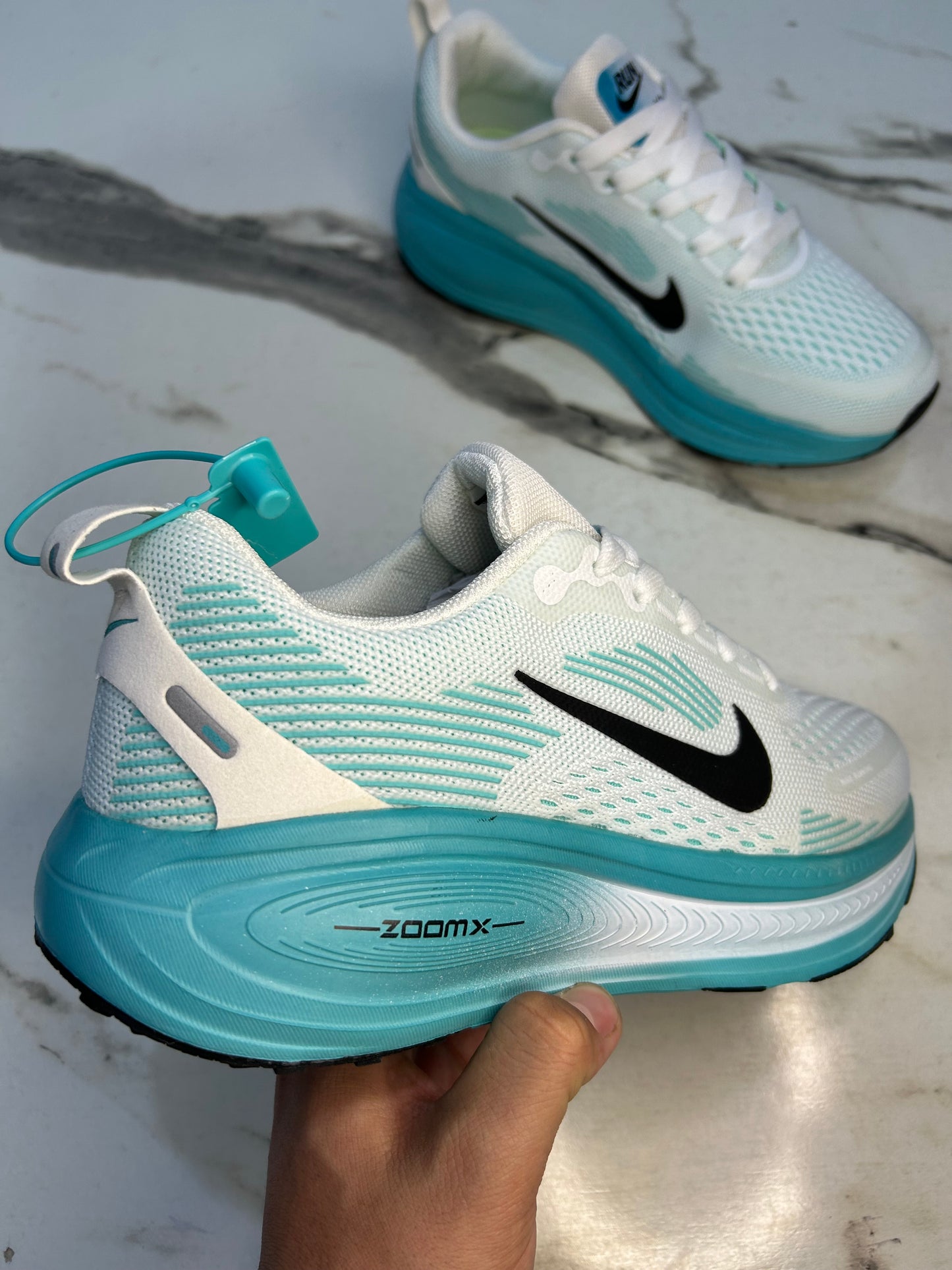 NK Zoom X Vomero 18